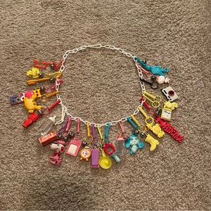 1980s Plastic Charm necklace w/ 24 charms